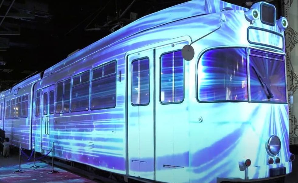 warp tram at Outlets Hiroshima projector sustainability
