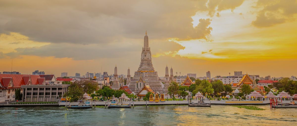 Wat Arun panorama view at sunset, A Buddhist temple in Bangkok, Thailand, Wat Arun is one of the most well known of Thailand's landmarks