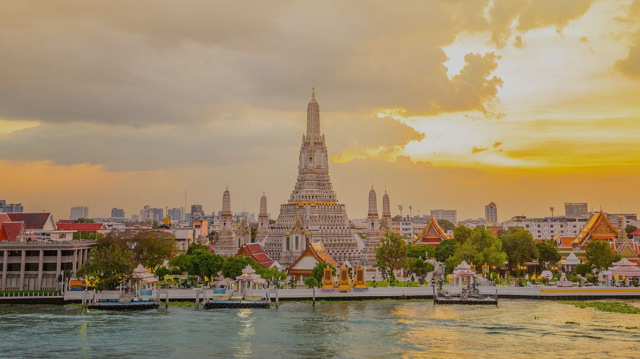 Wat Arun panorama view at sunset, A Buddhist temple in Bangkok, Thailand, Wat Arun is one of the most well known of Thailand's landmarks