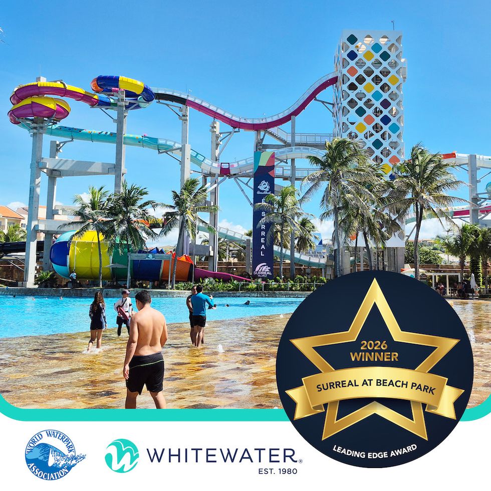 Water park with tall slides and palm trees, award badge in foreground.
