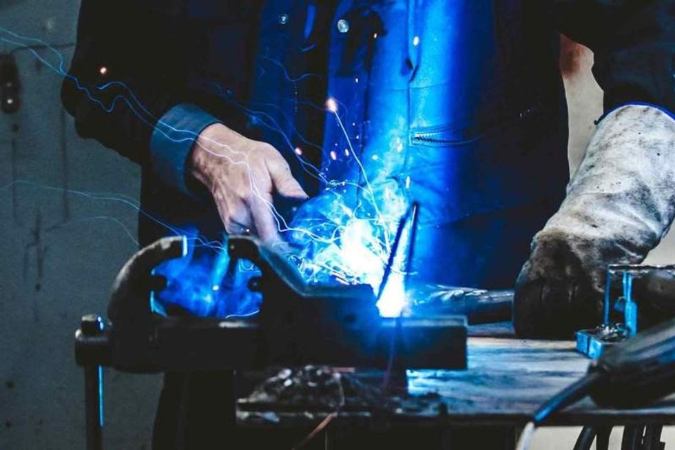 welder at tema design by mk illumination