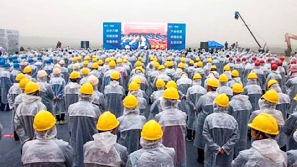 workers watch ceremony six flags haiyan china