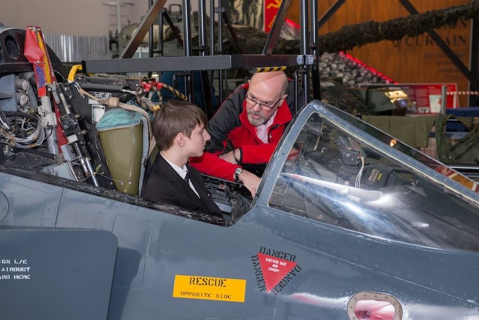 young visitor experiences life in the cockpit