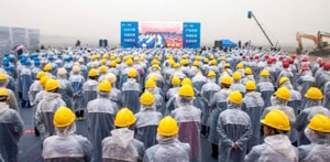 workers watch ceremony six flags haiyan china