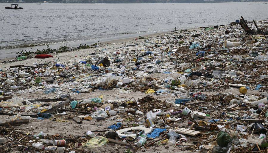 pollution covers a beach in Rio