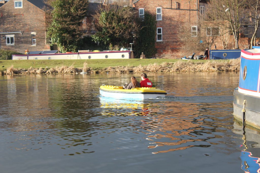 Two passengers enjoying the electric boats by Garmendale on open water