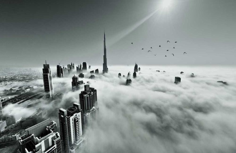 dubai skyscrapers through the clouds