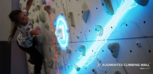 Augmented Climbing Wall by Valo Motion: Try out the world's first gaming platform for indoor climbing walls at IAAPA Expo