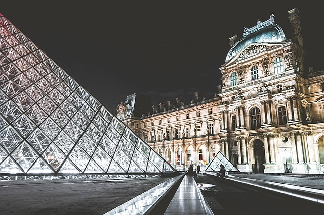 External view of the Louvre Museum, Paris at night.