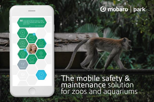 monkey in background mobile phone showing mobaro park safety solution for zoos