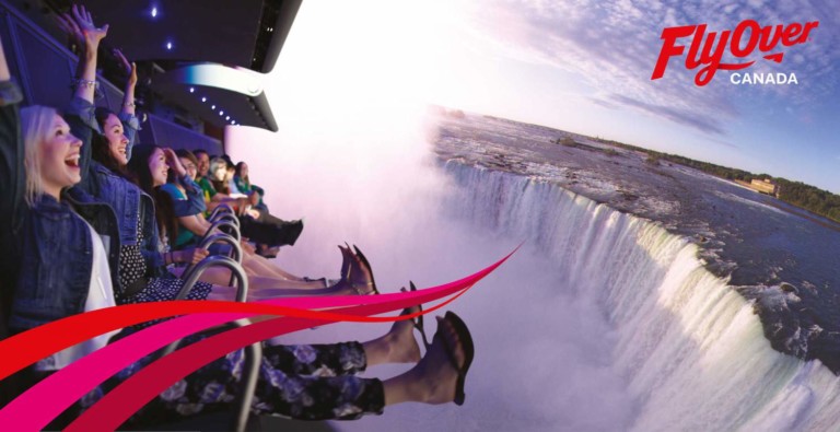 guests enjoying FlyOver Canada flying theatre experience