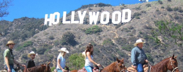 horseback riders on Karmel Shuttle tour to Hollywood sign