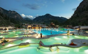 guests in ouray hot springs pool in the evening