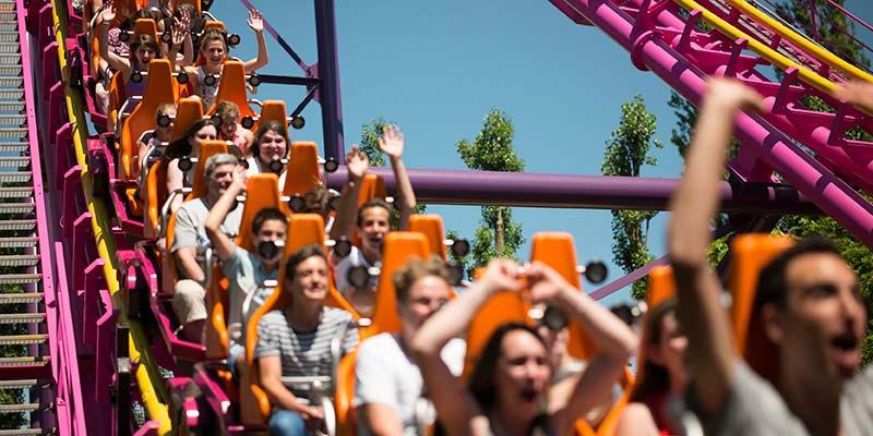 people enjoying roller coaster ride with tech installation by tejix