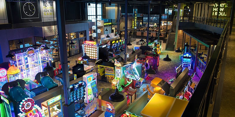 The Yard featuring amusement games at the Rec Room