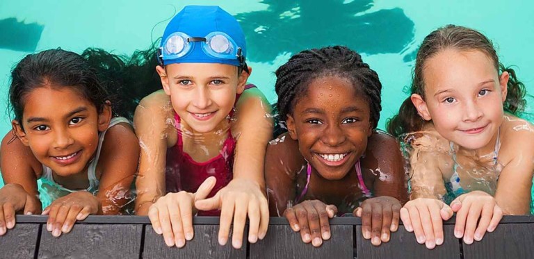 kids in pool - polin waterparks supports wlsl world's largest swimming lesson