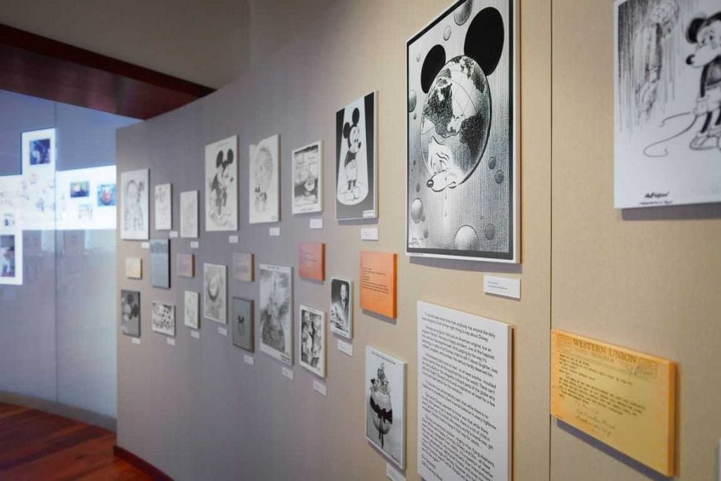 Wall display of Disney artwork