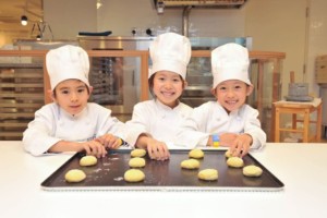 KidZania Bakery, three young bakers