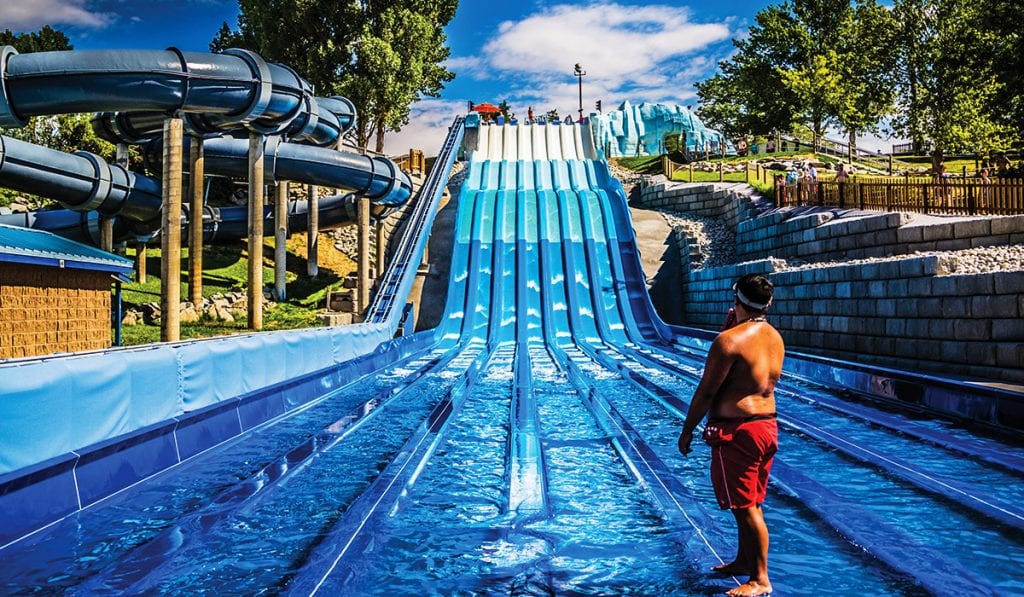 Bottom view of blue ProRacer with lifeguard in the middle