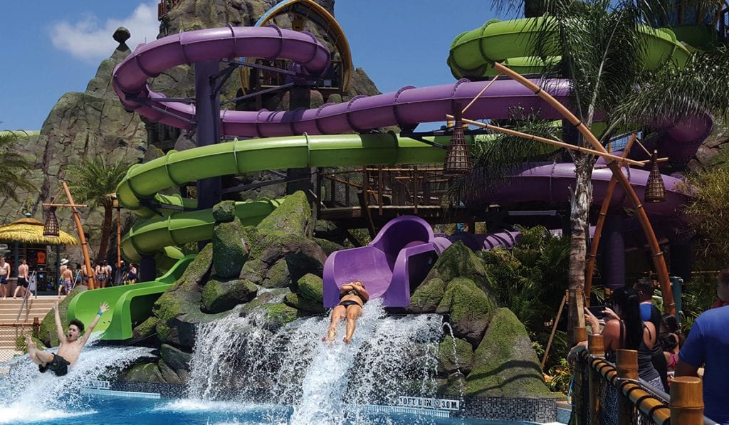 Landscape view of two individuals coming out of a twister before they hit the water