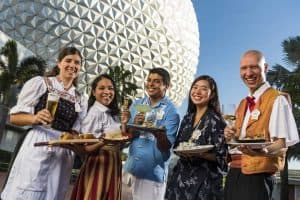 Five different cast members represent different country's food at Epcot International Food and Wine Festival