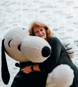 Karen Johnson, director of Charles M. Schulz Museum with Snoopy 