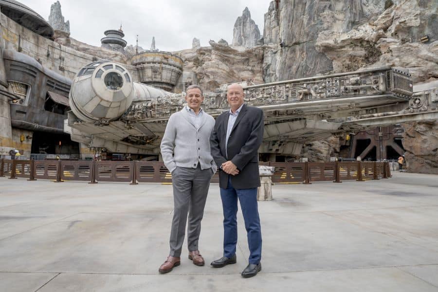 Bob Chapek and Bob Iger stand by the Millenium Falcon at Disney park