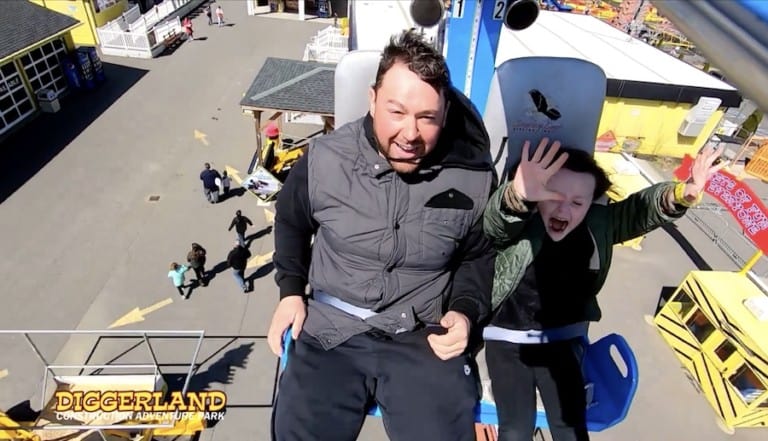 Connect&Go acquires Kool Replay. Family taking photo on a rollercoaster.