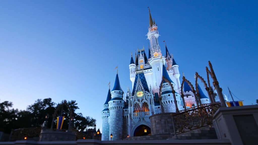 cinderella castle - walt disney world is just one of many theme parks responding to coronavirus