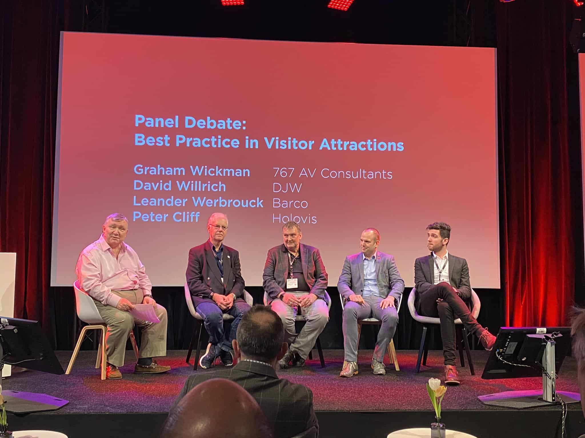 Panelists discuss visitor attractions at ISE show on a stage