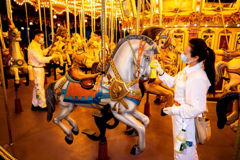 Staff cleaning carousel at Hong Kong Disneyland