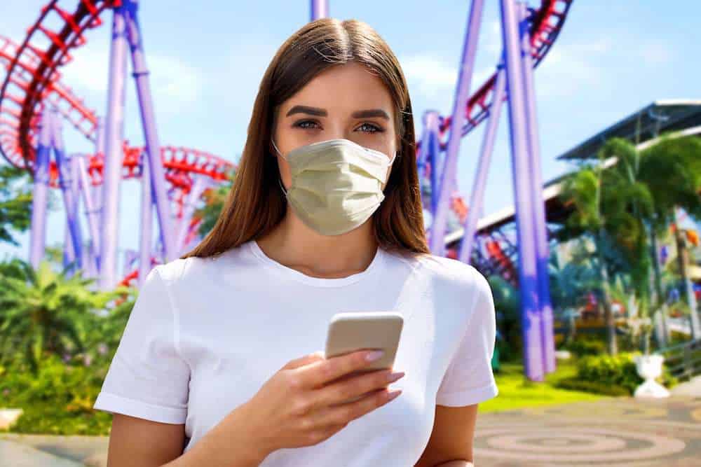 Guest in virtual queue wearing mask at a theme park