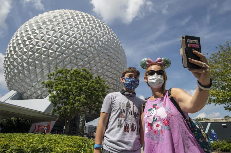 theme parks coronavirus guests wearing masks at Epcot Disney