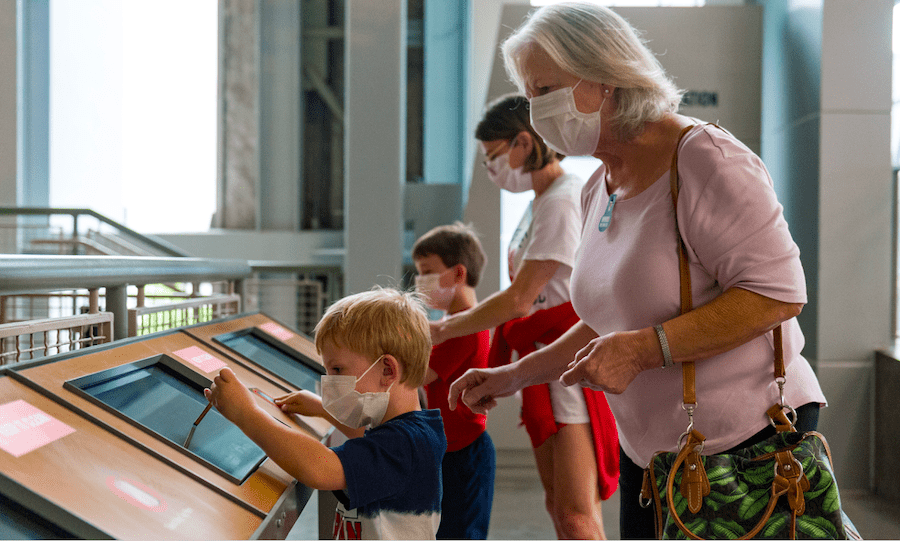 Touchless interactives at National WWII Museum museum visitors return