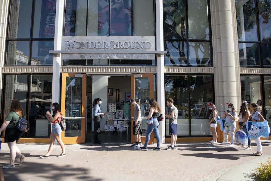 Guests wearing masks while visiting Downtown Disney District in Anaheim, California in July 2020. 