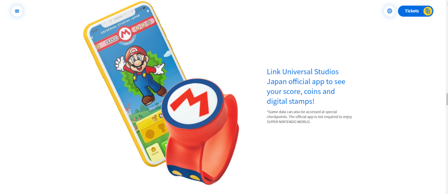 Super Nintendo World power up band next to mobile app