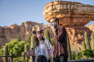 Couple at Disneyland in masks