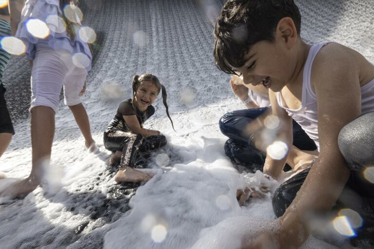 Children play at Surreal, The Water Feature