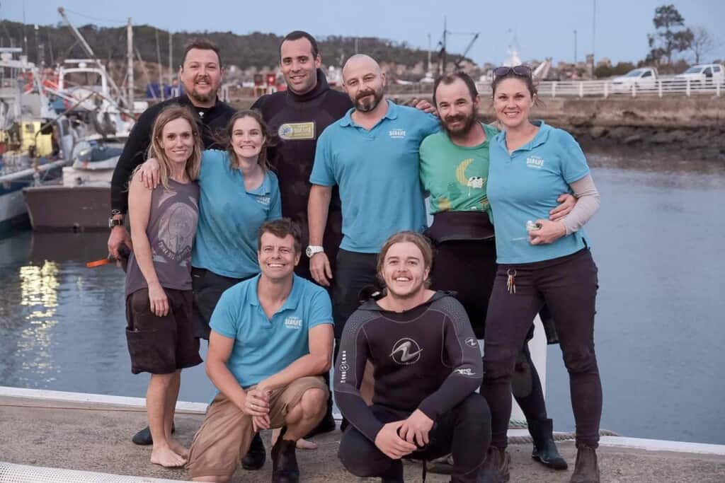 chris brown with sydney sealife aquarium team