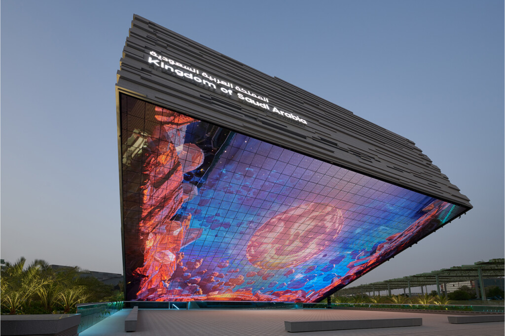 Saudi arabia pavilion by kraftwerk blooloop innovation awards 2022 exterior of pavilion featuring led screen