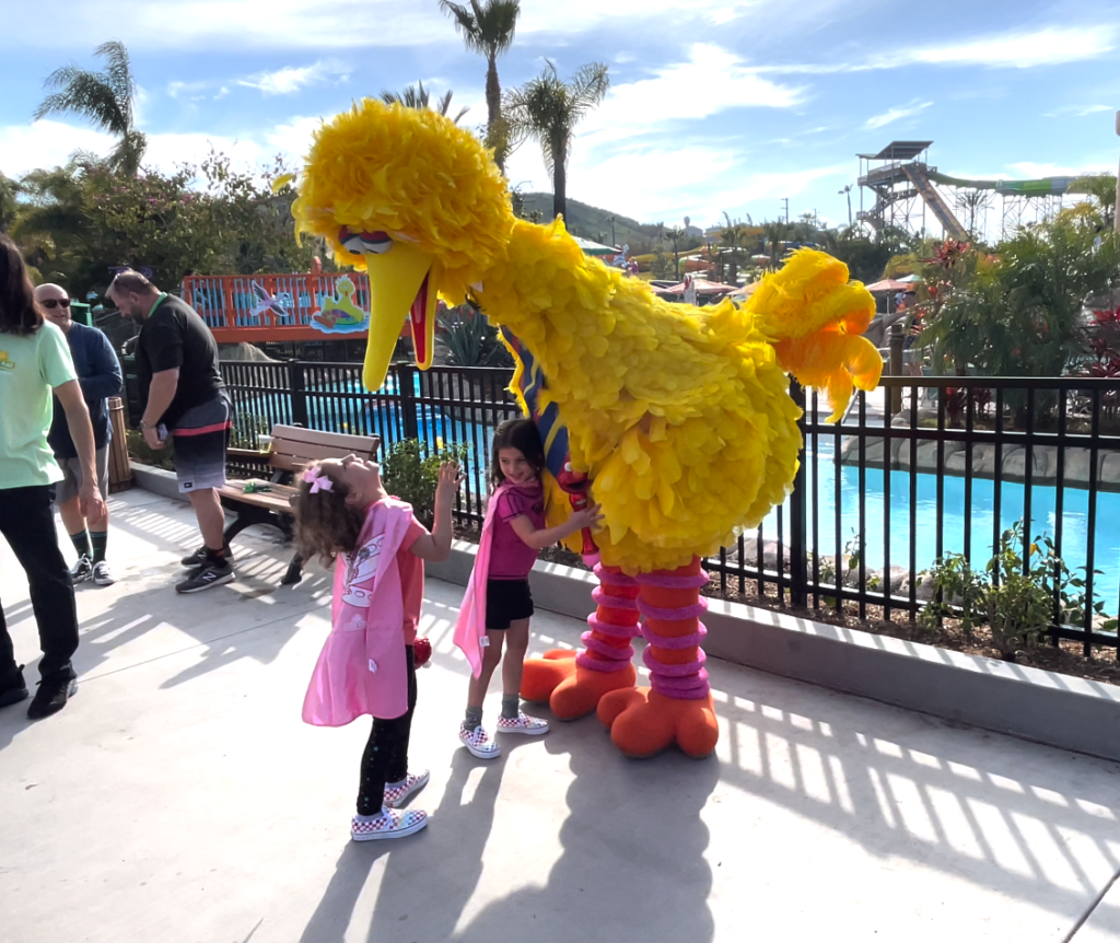 voice to puppeted characters by beaudry interactive blooloop innovation awards 2022 image shows big bird puppet greeting children