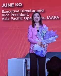 June Ko IAAPA Asia President with Flowers At IAAPA Asia 2023 