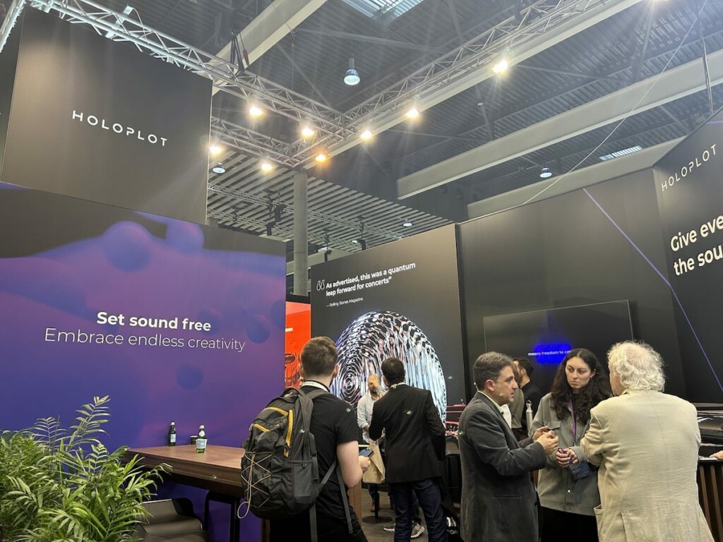 People at the Holoplot ISE booth