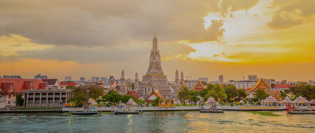 Wat Arun panorama view at sunset, A Buddhist temple in Bangkok, Thailand, Wat Arun is one of the most well known of Thailand's landmarks