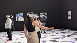 visitors use artmasters vr tool prado at nextin summit 2025