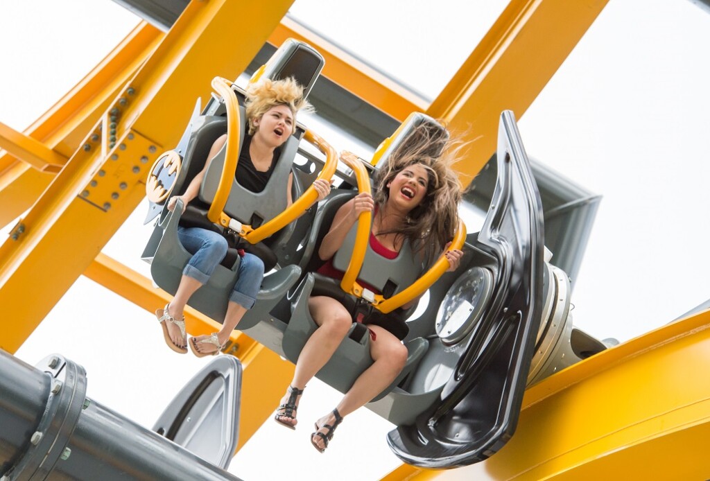 Two riders spinning through a 4D Free Spin Coaster
